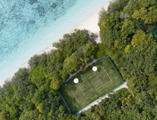 Maldives reference - Ball on green turf field - Act Sports, the Premium Artificial Sports Turf Supplier