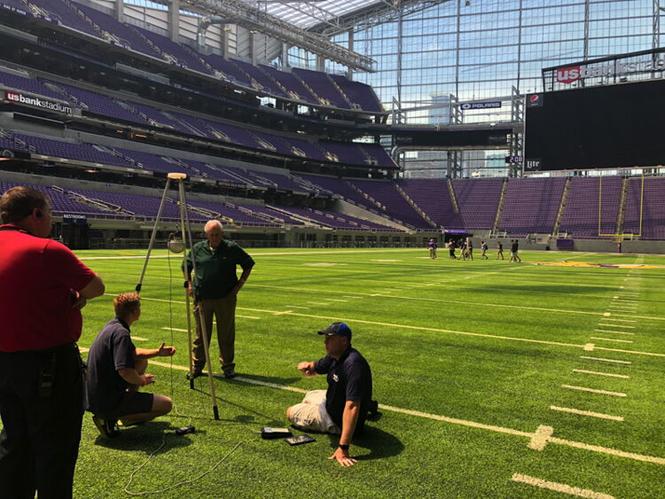 Field testing in football stadium Resized - Ball on green turf field - Act Sports, the Premium Artificial Sports Turf Supplier